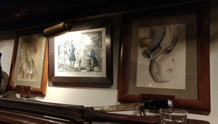 Photo of Benedict Arnold hangs upside down at the haunted '76 House Restaurant in New York