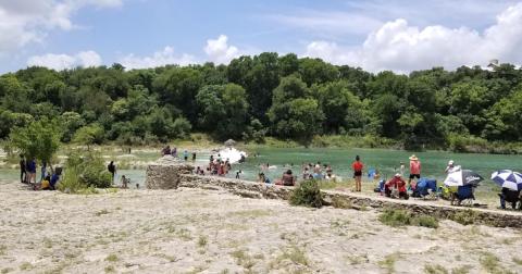 This Little-Known Dam Forms A Swimming Hole With The Most Crystal-Clear Water In Texas