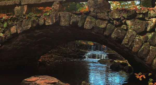 Cross An Old Bridge And Ogle A Dam Waterfall On This Fairy Tale Trail In Maine
