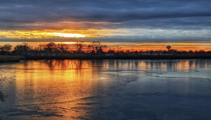 Blue and orange sunset at Lake Renwick in Illinois