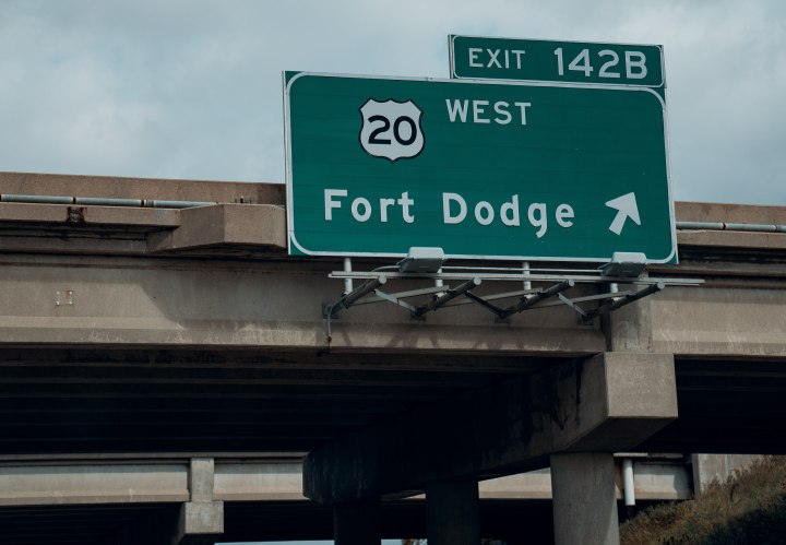 A highway exit sign toward Fort Dodge, Iowa and US Highway 20 (Exit 142B) along I-35 northbound near Williams, Iowa.