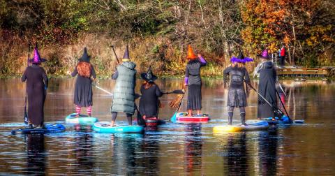 100 Witches Paddleboarding Across Chatfield Reservoir In Colorado Is The Halloween Event You Never Knew You Needed
