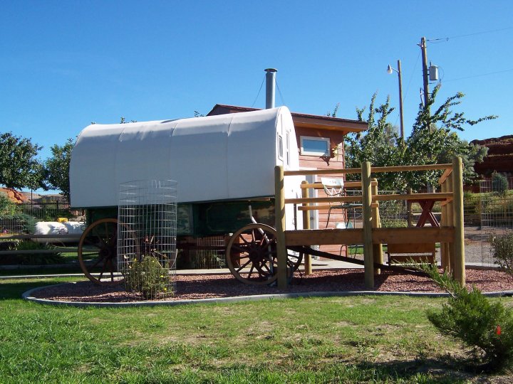 historic covered wagon in wyoming at K3 Guest Ranch