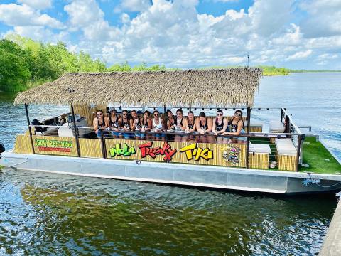 You Can Cruise Around The Bayou On This Floating Tiki Bar In Louisiana