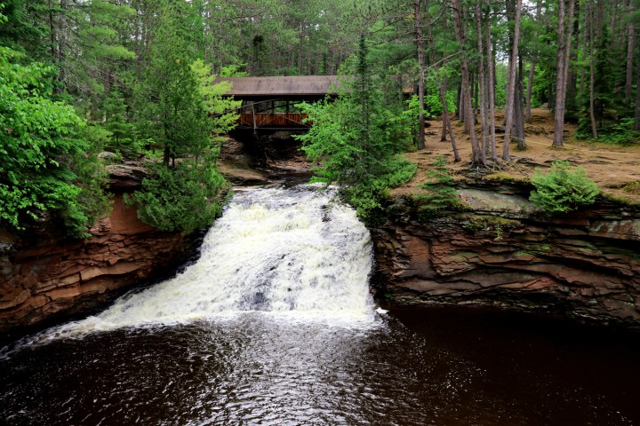 Covered bridge and Waterfall at Amnicon Falls State Park in Wisconsin