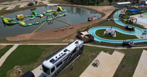 The Most Epic Resort Campground In Texas Is An Outdoor Playground With A Lazy River, Swim-Up Bar, Inflatable Waterpark, And More