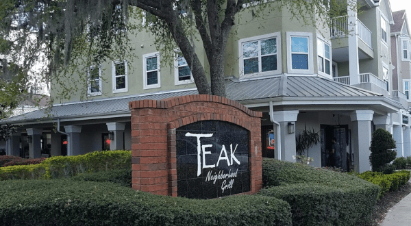 You’ll Barely Be Able To Take A Bite Of The Massive Burgers At Teak Neighborhood Grill In Florida