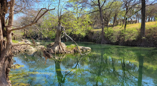 Cypress Bend Park Is A Riverfront Park In Texas Where The Water Is A Mesmerizing Blue