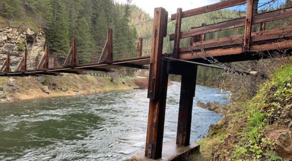 Walk Across A Foot Suspension Bridge On The St. Joe National Forest Trail 17 In Idaho