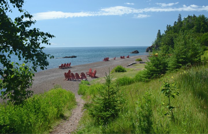 Sunny summer vista on the Lutsen Resort beachfront, along the scenic north shore of Lake Superior in Minnesota.