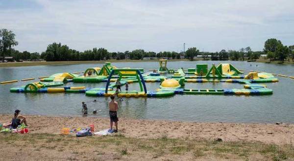 The Most Epic Resort Campground In Iowa Is An Outdoor Playground With A Water Obstacle Course, River Tubing, And More