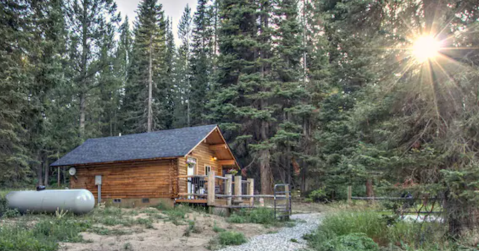 You'll Never Forget Your Stay At This Charming Cabin In Montana With Its Very Own Fishing Pond