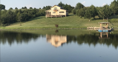Enjoy A Water-Filled Weekend At This Lakefront Cabin In Kansas With Its Own Trampoline