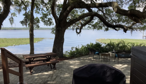 Soak In A Hot Tub Surrounded By Lake Kerr At This Epic Cabin In Florida