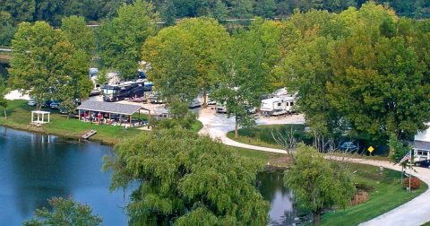 With 30-Acres Of Lake, A Swimming Beach, And Paddle Boats, This RV Campground In Illinois Is A Dream Come True