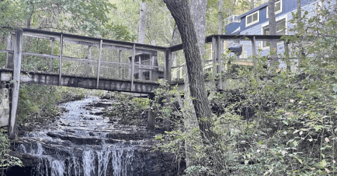 A Hidden Paradise In Alabama, This Whimsical Cottage Has Its Very Own Private Waterfall