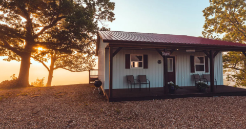 The Cabin Surrounded By Fall Foliage Is The Best Place For An Autumnal Getaway