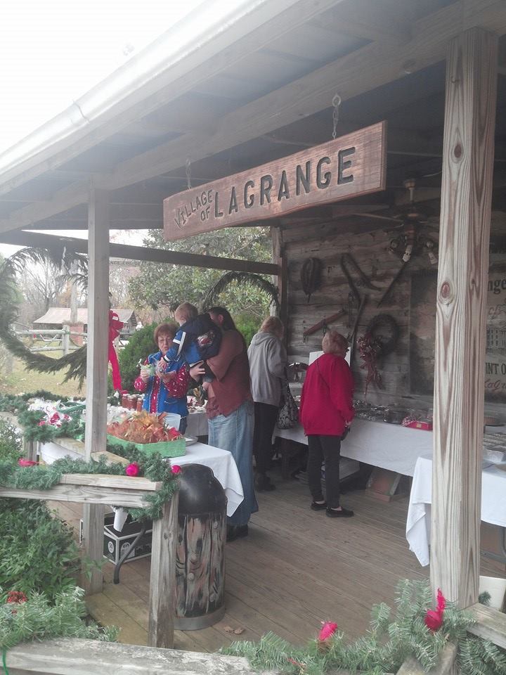 People shop for crafts and baked goods at LaGrange Historic Site's Christmas in the Country event, which allows guests to experience a pioneer Christmas in Alabama.