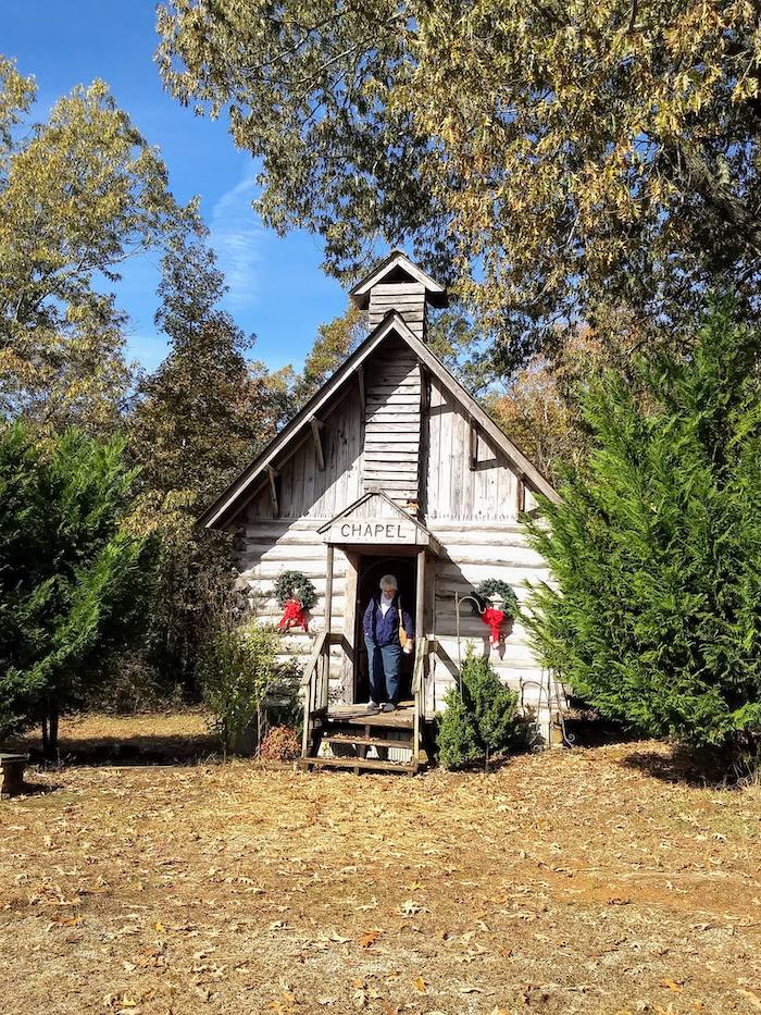 A woman walks out of the chapel at LaGrange Historic Site's Christmas in the Country event.