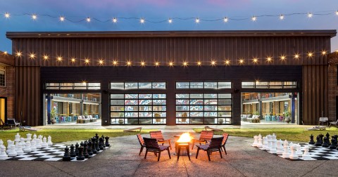 Stay In A 1970s-Themed Hotel Overlooking A Fire Pit In Iowa