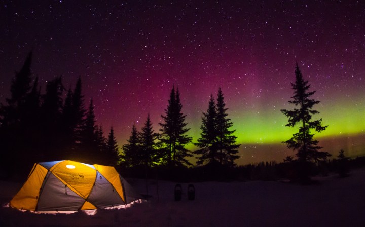 Tent camping under the northern lights