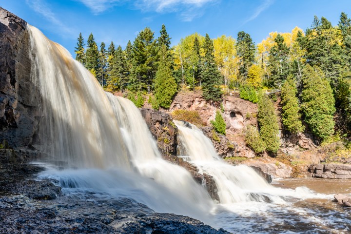 The waters of the Gooseberry River fall crashing onto the rocks in Northeastern Minnesota.
