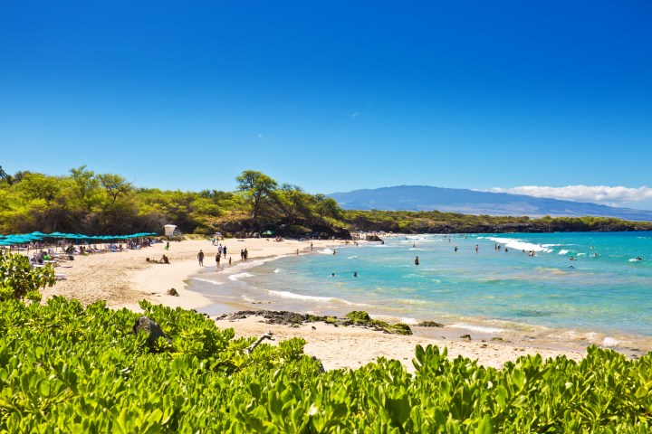 Hapuna Beach, one of the most popular white sand beach on the Big Island of Hawaii. A frequent destination for local residents and tourists alike. Located in South Kohala on the northwest shore of the island of Hawaii with beach front resort and hotel nearby.